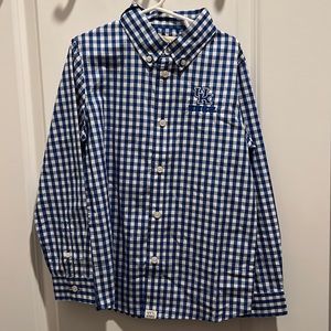 University of Kentucky blue and white long sleeved button down shirt.